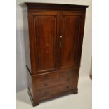 A 19th century mahogany and satinwood banded 2-section linen press, width 4'2", height 7'.
