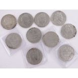 Group of continental silver coins.