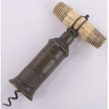 A Wilmot & Roberts patent brass corkscrew with bone handle.