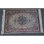 A small Tebriz style silk rug with symmetrical pattern, 4'8" x 3'2".