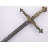 A continental ceremonial sword, 20th century with cast brass cross hilt and etched blade,