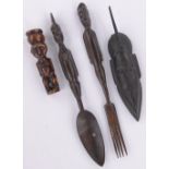 A group of African horn and wood carvings, (4).