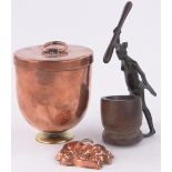 A Victorian copper pudding steamer, a smaller copper mould and an African bronze figure, (3).