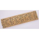A 19th century relief carved ivory plaque, with geometric acanthus scroll design, 27.5cm x 7cm.