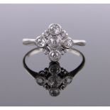 A 5 stone diamond set open work panel ring, 18ct white gold and platinum settings,