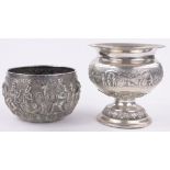2 19th century unmarked Oriental white metal bowls, with relief embossed surrounds,