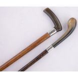 2 Horn and silver handled walking sticks.