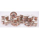 A quantity of Copeland Imari pattern teaware, comprising 11 tea cups, 11 saucers and 12 coffee cups.