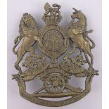 A Royal Artillery helmet plaque, height 10.5cm.