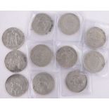 Group of continental silver coins.