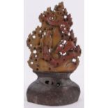 A Chinese soapstone carving, depicting Oriental figure and stag in woodland, height 26cm.