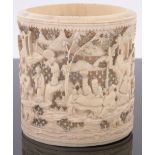 A 19th century Chinese relief carved and reticulated ivory vase, decorated with figures in gardens,