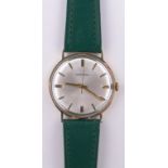 A gent's Garrard 9ct gold cased mechanical wristwatch, case width 32mm, original box, working order.