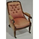 A William IV rosewood framed open armchair with studded upholstery and fluted legs.