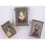 3 Victorian nickel plate and brass vesta cases with inset photo panels, largest height 5.5cm, (3).