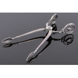 Pair of Georg Jensen sterling silver tongs, import marks London 1923, length 10cm.