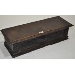 An Antique carved oak table cabinet of small size, with single drawer and carved edge, width 2'3",