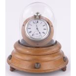 A turned wood and domed glass pocket watch stand,