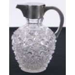 A Victorian cut-glass and silver mounted claret jug, hallmarks London 1888, height 20cm.