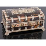 An early 20th century Indian tortoiseshell and ivory domed top jewel box,