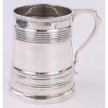 An Edwardian silver half pint christening mug, by Edward Barnard & Sons, London 1907, height 9cm,