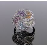 A modern 9ct white gold multi-colour stone set flower head design ring, setting height 20mm, size O.