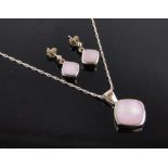 A 9ct gold pink mother of pearl set pendant and chain and pair of matching earrings,