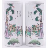 Pair of Chinese porcelain cylindrical vases, with painted scenes of children playing,