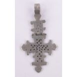 An unmarked white metal Coptic cross pendant, length 70mm.
