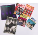 A group of Beatles brochures, including Beatles Ltd.
