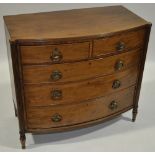 A Regency mahogany bow front chest of 2 short & 3 long drawers, reeded columns, width 3' 5",