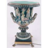 A continental Majolica pottery campana form ceramic urn shaped lamp, on brass base, height 53cm,