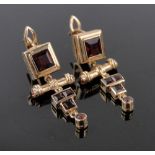 Pair of 14ct gold square-cut garnet set drop earrings, length 30mm.