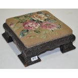 A Victorian carved oak stool, with needlework upholstered seat, width 13", height 5".