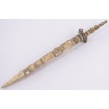 A 19th century Oriental carved ivory pointer, with gilt bronze Buddha's head finial, length 24cm.