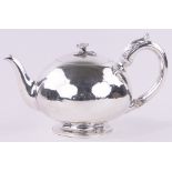 A William IV circular silver teapot with floral knop, London 1836, 19 oz.