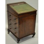 A Regency mahogany Gillow style swivel top Davenport,