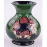 A Moorcroft Anemone pattern bulbous vase, height 9.5cm.