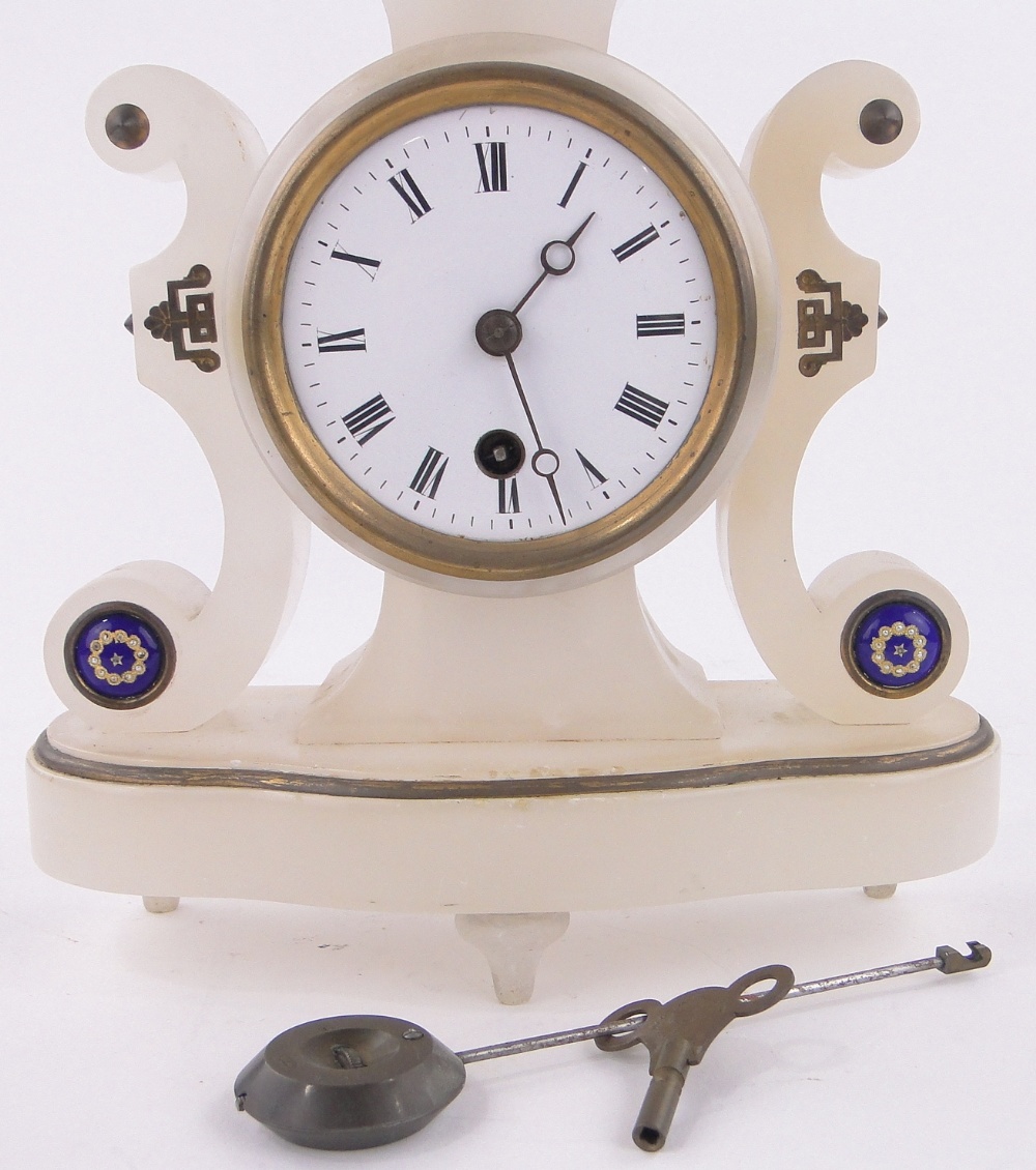 A 19th century French alabaster scroll cased mantel clock surmounted by an urn, height 29cm. - Image 3 of 3