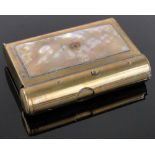 A brass and mother of pearl inset vesta case with integral cigar cutter, length 6cm.