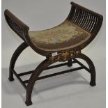 An Edwardian mahogany and marquetry decorated X frame stool, width 1'10", height 1'10".