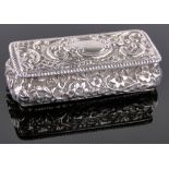 An Edwardian rectangular silver trinket box, with ogee sides and embossed decoration, Chester 1909,
