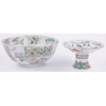A 19th century Chinese porcelain bowl, with painted figures in Court gardens,