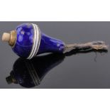 A blue and white banded enamel electric bell push, length 4.5cm.