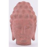 A terracotta Buddha's head, height 37cm.