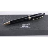 A Mont Blanc LeGrand ballpoint pen, black resin with gold plated trim, boxed with paperwork.