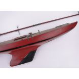 A scratch-built wooden hulled Vintage pond yacht, with mask, length 126cm.