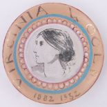 A Fulham Pottery plate by Quentin Bell, with painted and incised portrait of Virginia Woolf,