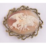 A Victorian carved Cameo brooch, relief carved classical horses and angel, unmarked gold frame,