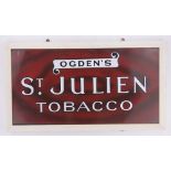 An Ogden's St. Julien Tobacco brown ground Vintage enamelled advertising sign, 46cm x 88cm, framed.